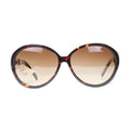 Sunglasses with tortoiseshell frame and brown gradient lenses on a white background