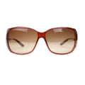 Brown sunglasses with a gradient lens on a white background
